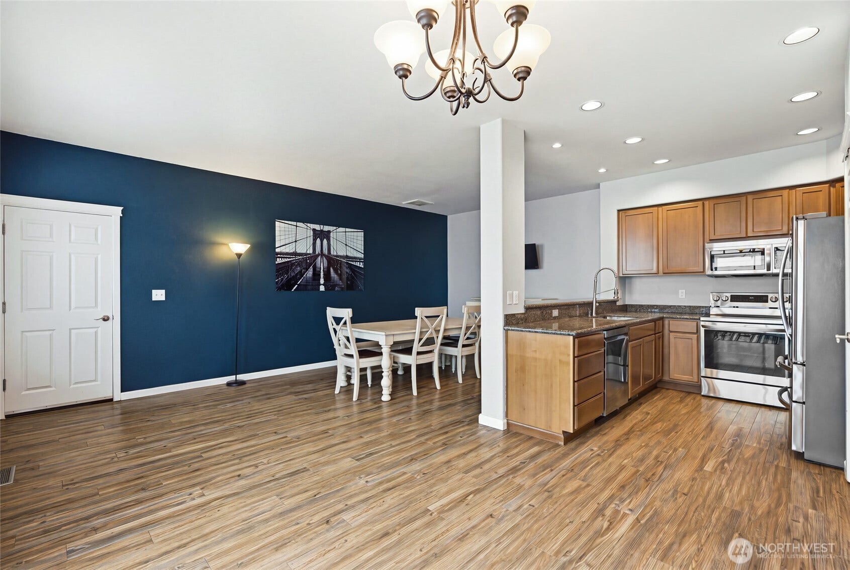 4628 Durham Street SE, Lacey, WA 98503 Open dining with accent wall, flowing into the kitchen and great room.
