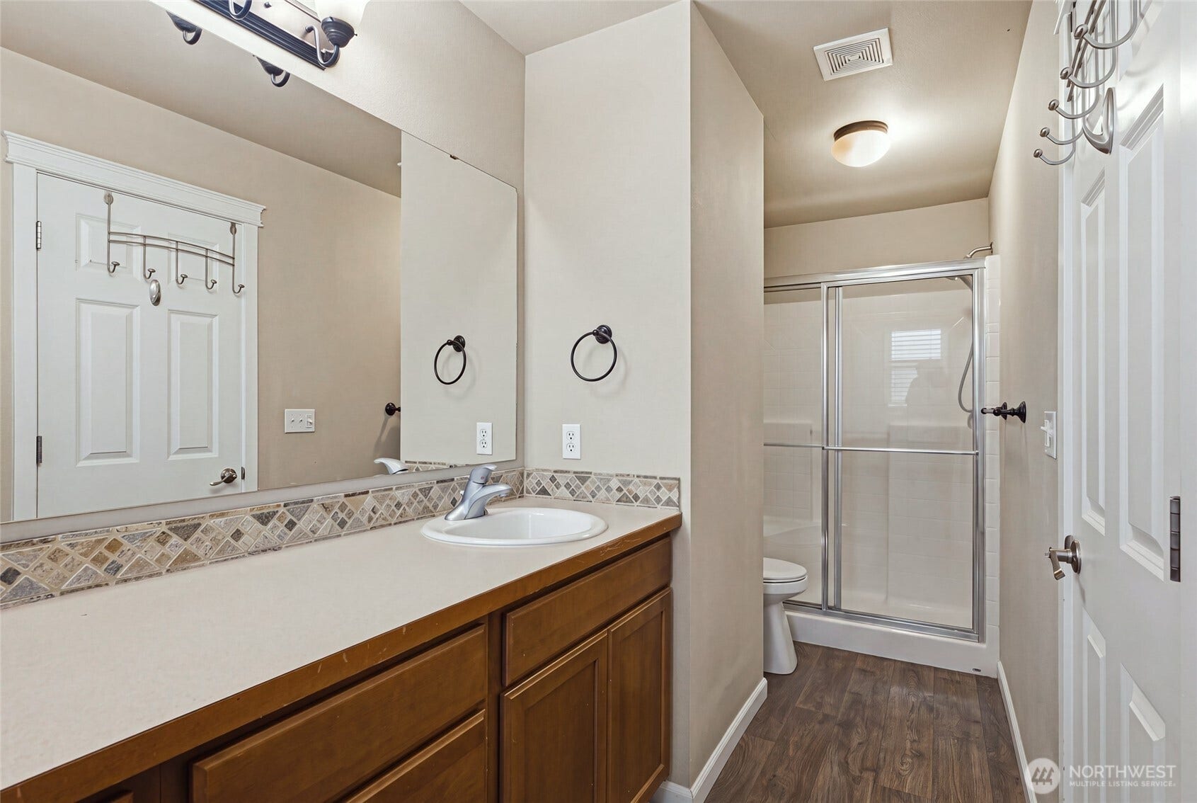 4628 Durham Street SE, Lacey, WA 98503 Primary 3/4 bath with walk-in shower and new flooriing.