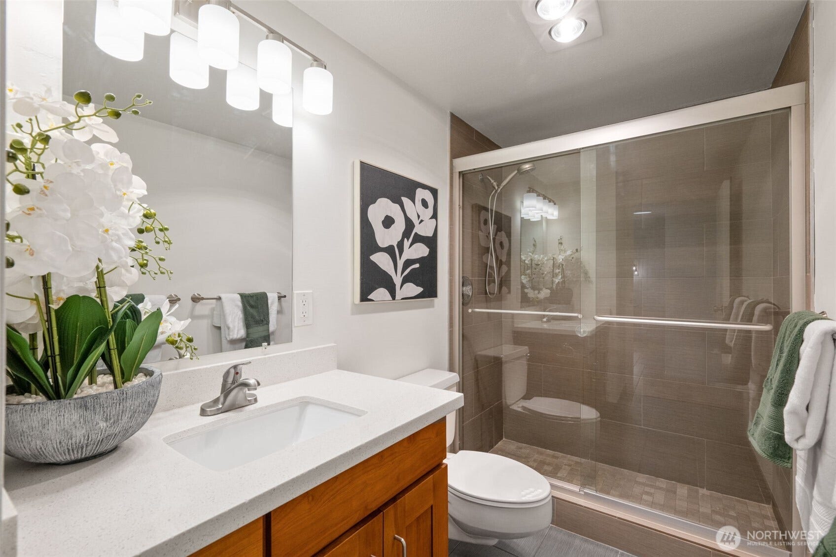 Second updated bathroom with walk-in shower.