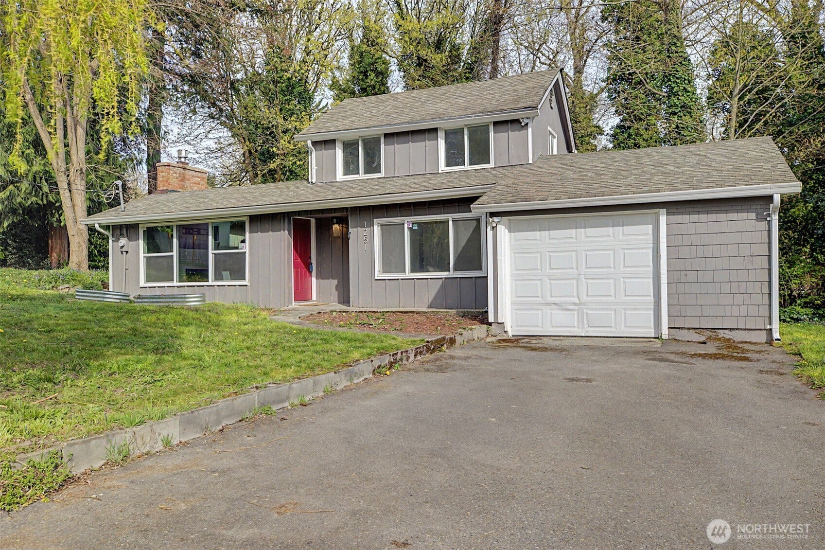 1251 S 230th Street, Des Moines, WA 98198 I am recently updated throughout but have the stability of a hundred year old home!