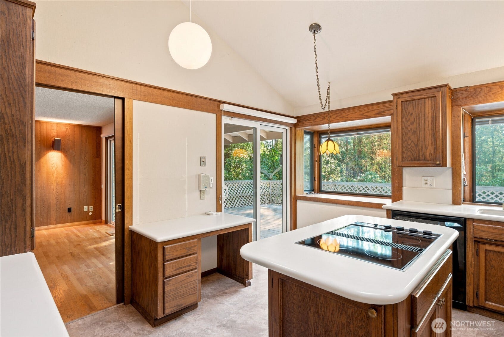5628 139th Street NW, Gig Harbor, WA 98332 stove on the island. Built-in desk in kitchen