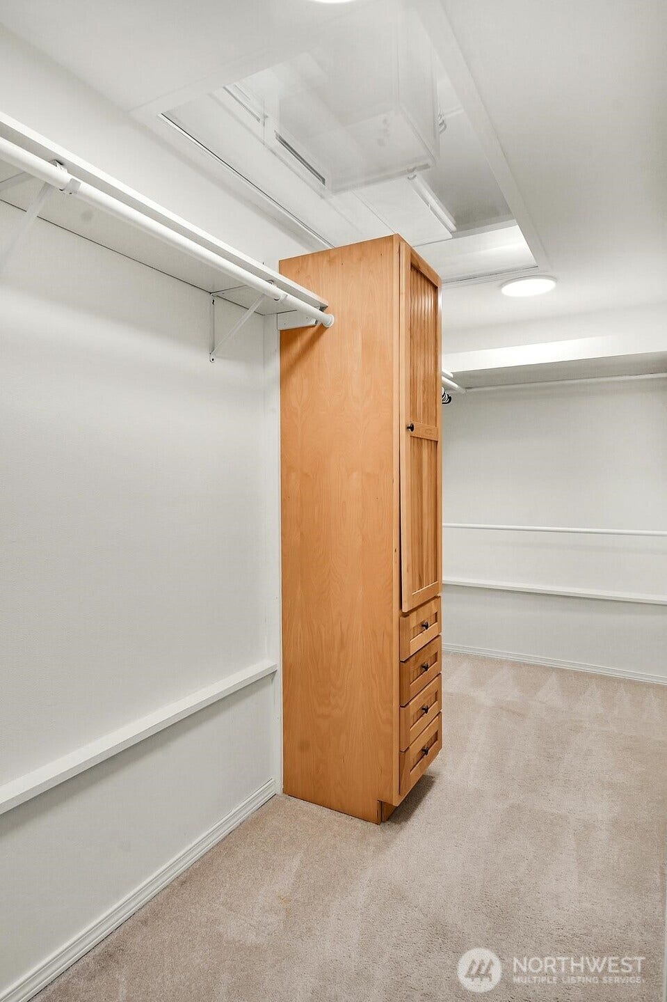 9013 25th Avenue NE, Seattle, WA 98115 Huge bright primary walk in closet.