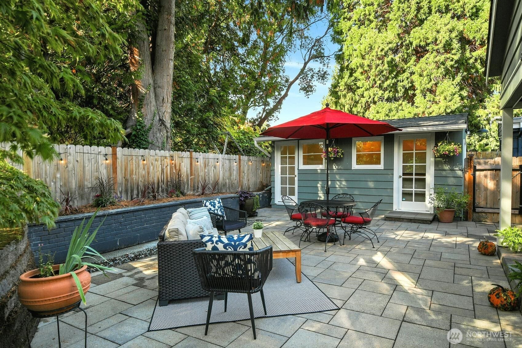 9013 25th Avenue NE, Seattle, WA 98115 Big backyard patio and studio with heat and power.