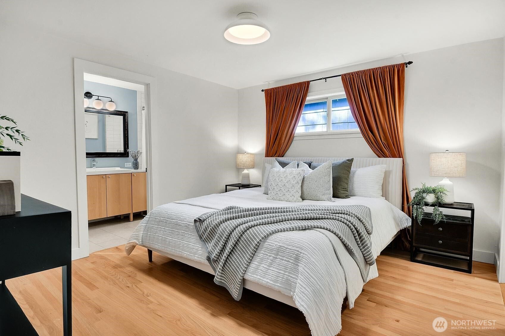 9013 25th Avenue NE, Seattle, WA 98115 Primary bedroom with ensuite and large walk in closet.