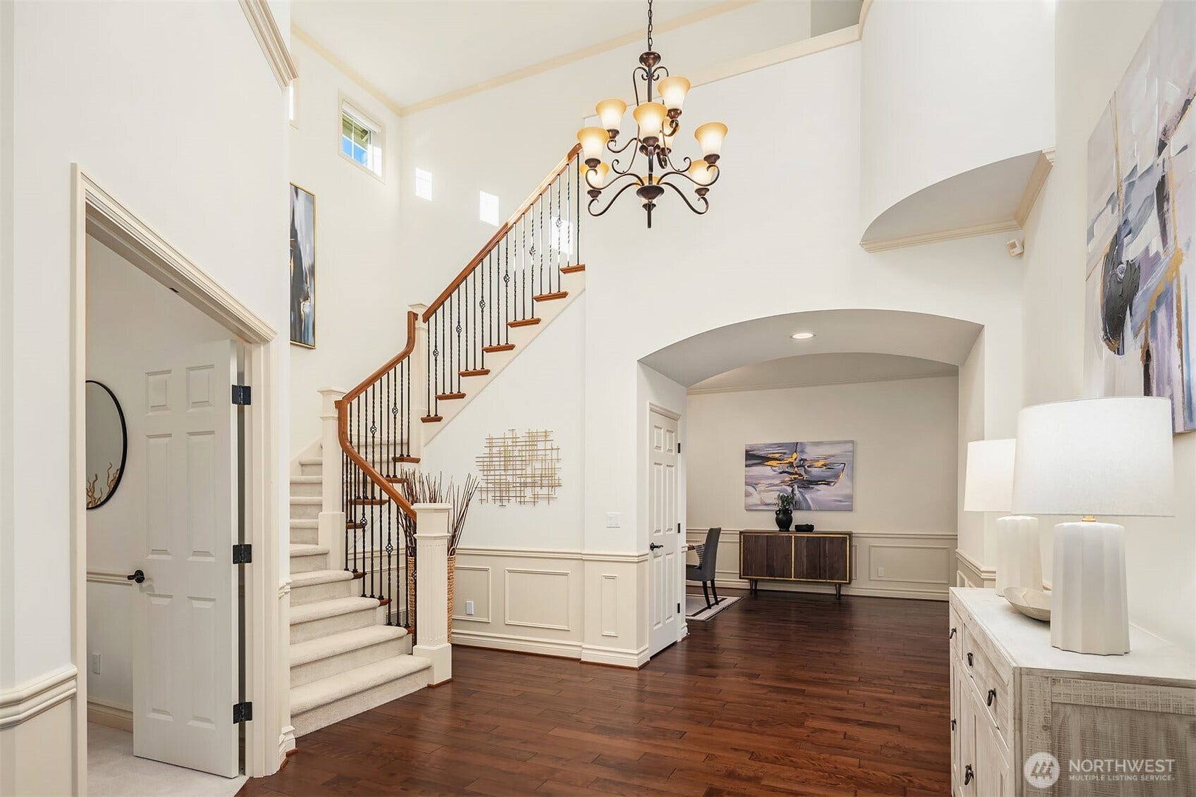 1836 273rd Place SE, Sammamish, WA 98075 A grand entry showcases soaring ceilings, signature millwork, wide-plank hardwood floors & an impressive staircase with iron balusters.