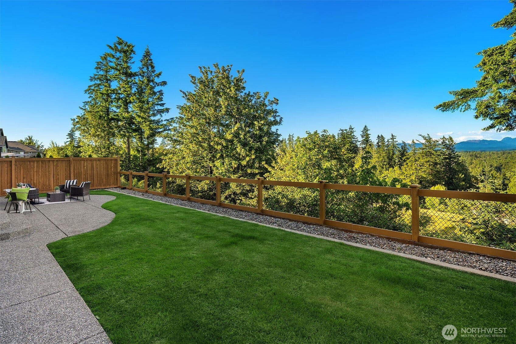 1836 273rd Place SE, Sammamish, WA 98075 Framed by lush green space and expansive views, this distinguished residence offers privacy, sophistication and exceptional craftsmanship.
