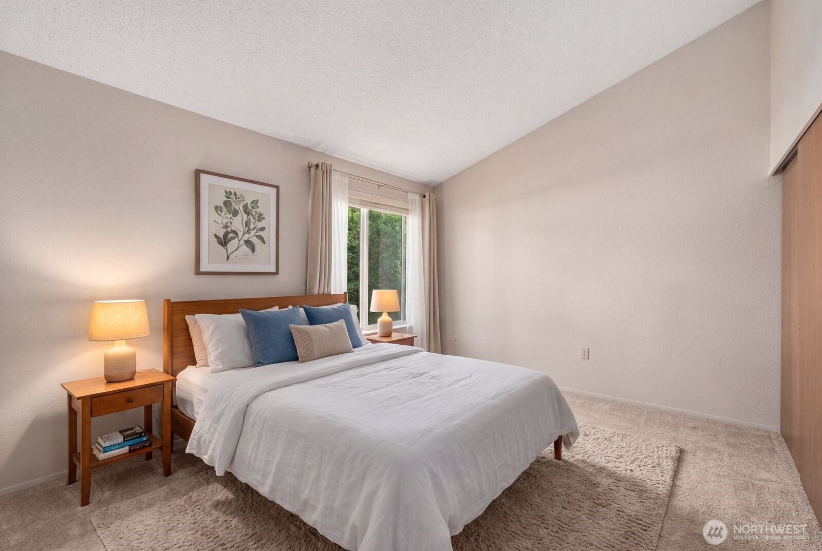 11802 98th Avenue NE, #B6, Kirkland, WA 98034 The second bedroom is also spacious, has vaulted ceilings and provides plenty of space for all of your needs. This is virtually staged and is option 1 of 2.