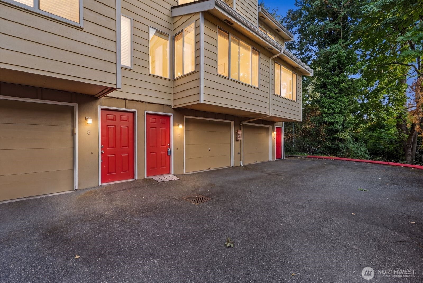 11802 98th Avenue NE, #B6, Kirkland, WA 98034 Beautiful 3-story townhome nestled in desirable Hillside Village in the heart of Juanita! Light-filled and open, this stylish residence offers generous living spaces, 2 spacious bedrooms with soaring vaulted ceilings, and 1.5 baths. Enjoy plush carpeting throughout and a modern kitchen complete with durable quartz countertops, timeless cabinetry, and stainless steel appliances. The inviting living room serves as the ideal retreat, anchored by a cozy wood-burning fireplace for chilly Northwest evenings. Step outside to your private deckperfect for morning coffee or hosting intimate summer gatheringsand take in seasonal views of Lake Washington from the front bedroom! An oversized 1-car garage provides exceptional functionality, featuring an expanded flex space ideal for extra storage, a workshop, or home gym gear, plus dedicated guest parking nearby. Enjoy low HOA dues and an effortless, walkable lifestyle! Unbeatable location: walk to Juanita Village shops & popular restaurants.