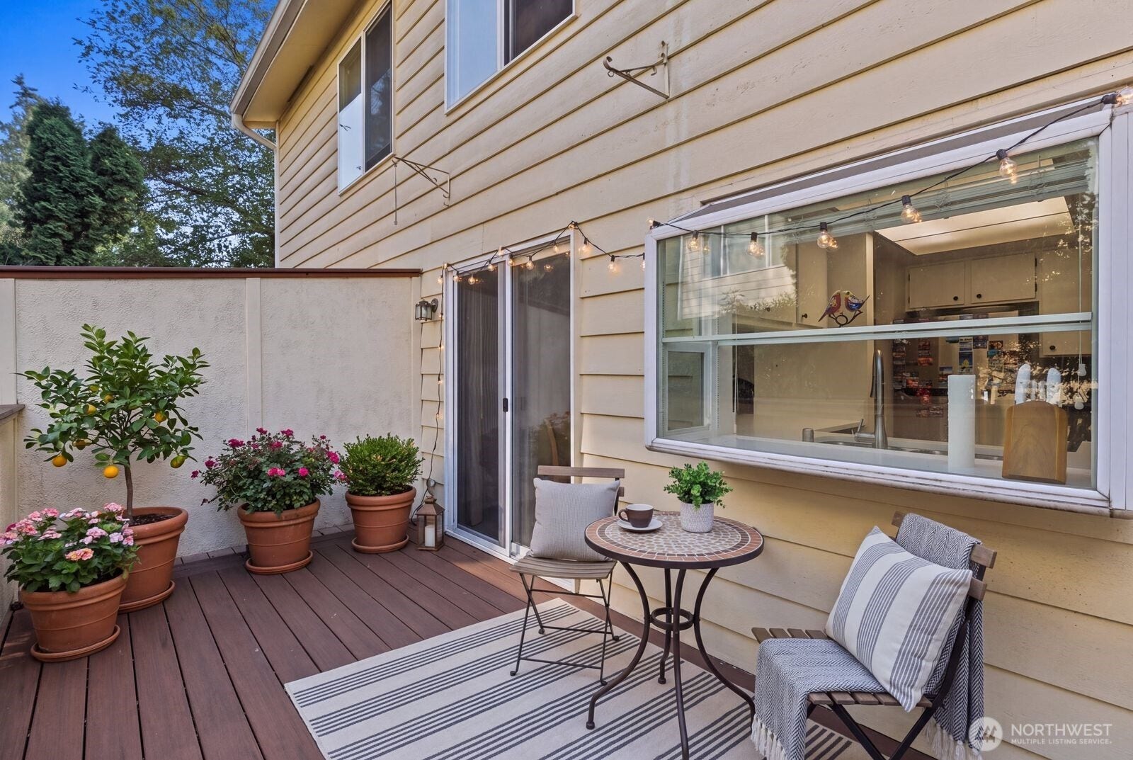 11802 98th Avenue NE, #B6, Kirkland, WA 98034 Spacious private deck which provides a great place to relax. This picture was virtually staged.
