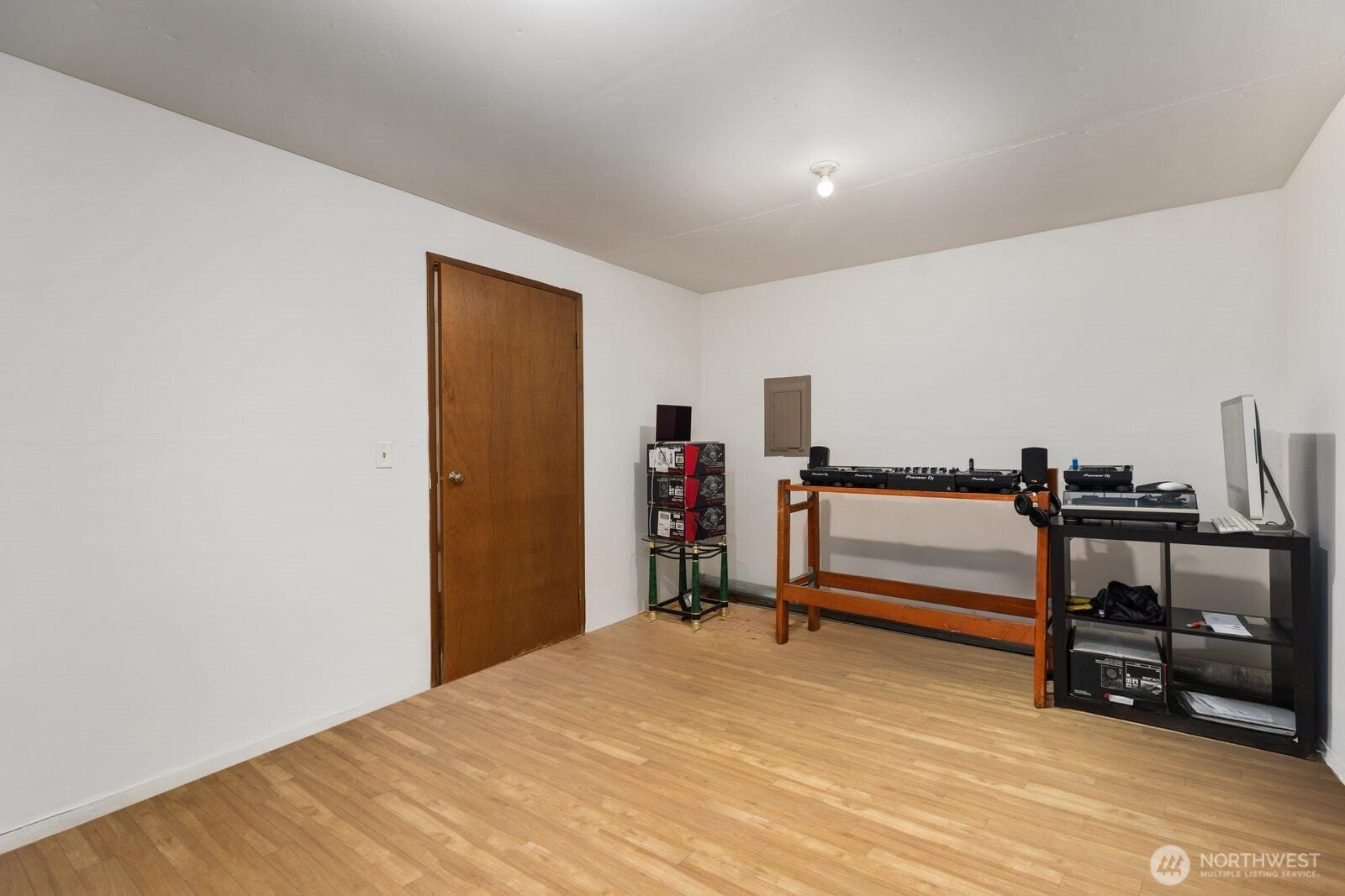11802 98th Avenue NE, #B6, Kirkland, WA 98034 The flex/storage space on the lower level. It also has a custom sound proofing so as to provide so many options. The seller uses it as his DJ space and has never had a complaint form his neighbors. Great home gym space, office, media room or simply a huge storage space.