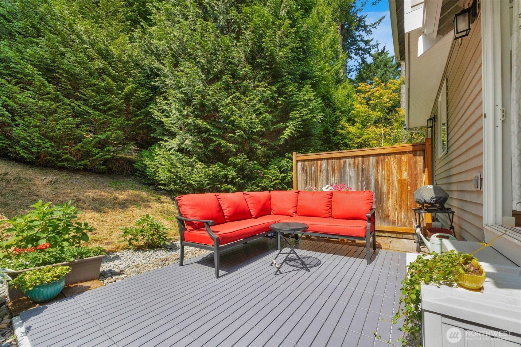 Secluded patio with new interlocking tiles.