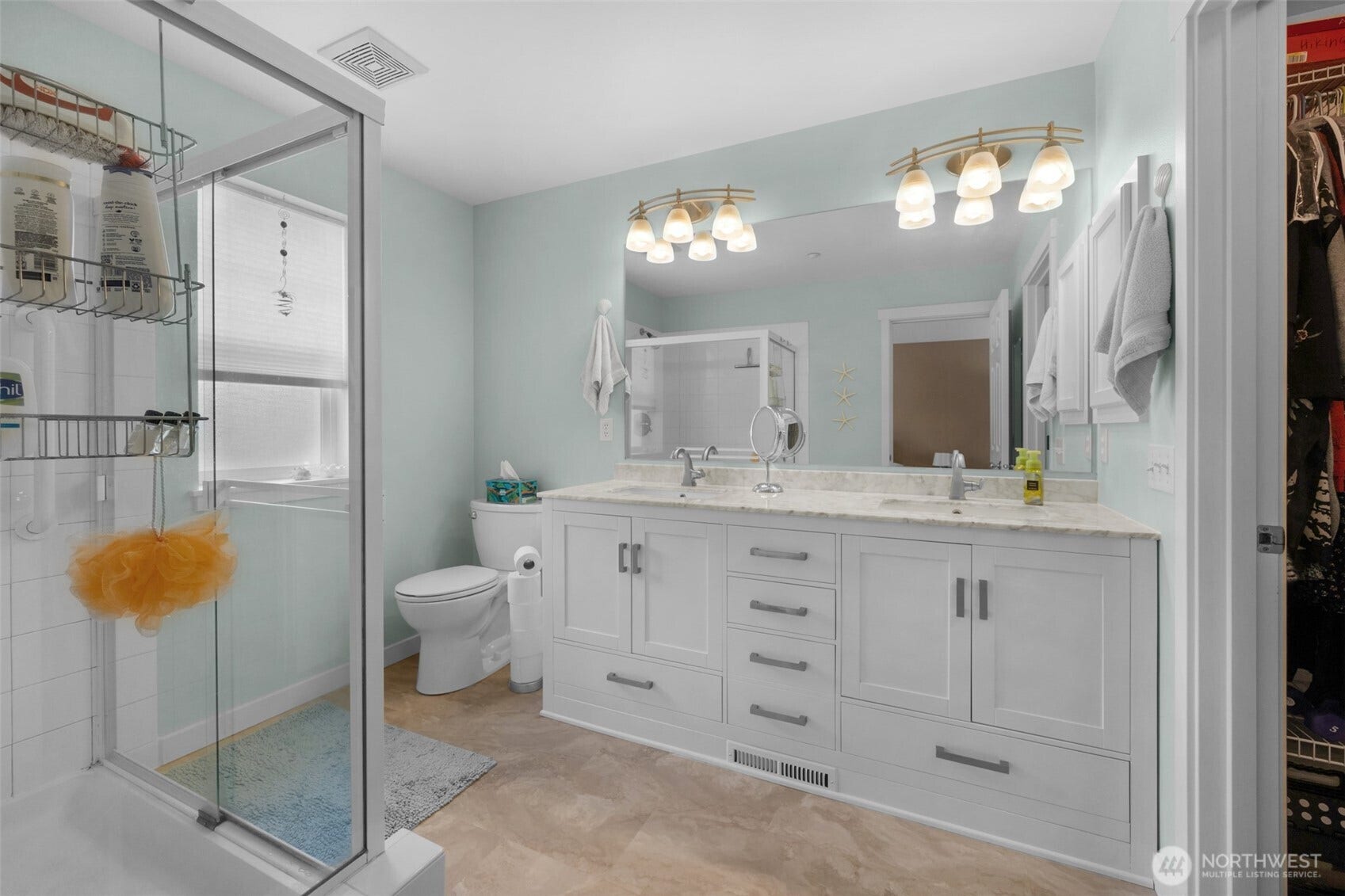 Remodeled primary 3/4 bathroom.