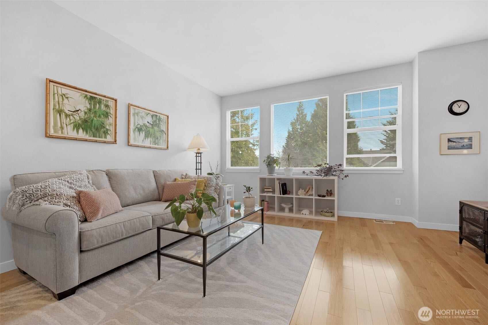 Lovely living room with 9 foot ceilings and east facing windows to enjoy the territorial view.