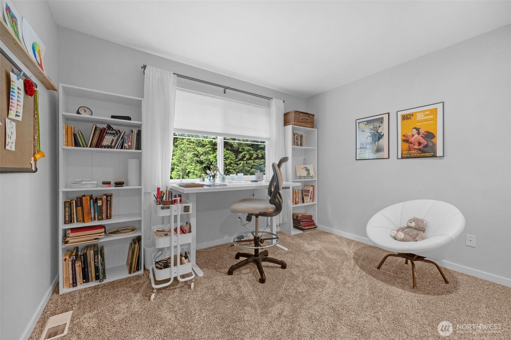 Second bedroom currently used as a craft room.