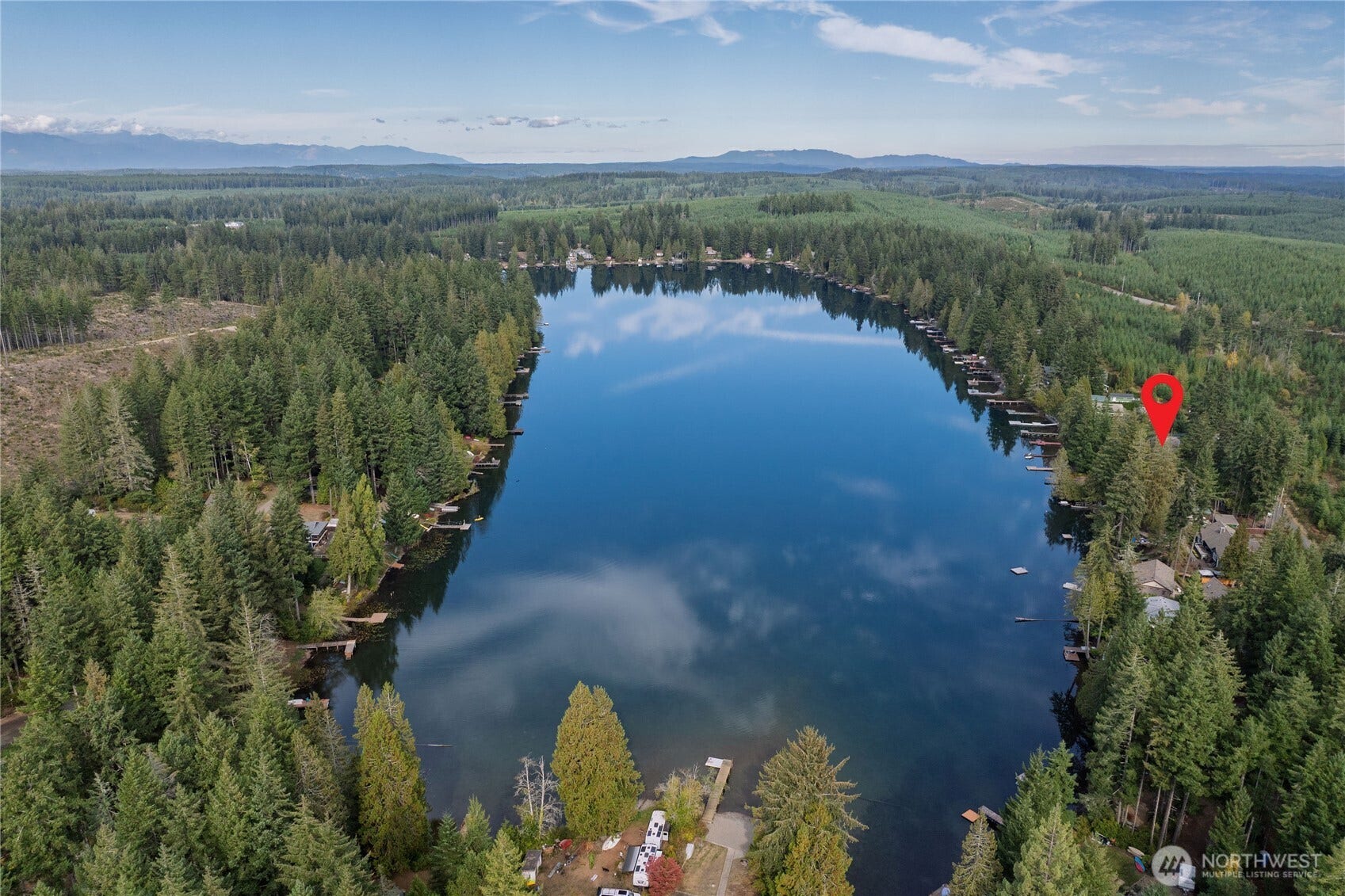 Located on the premier Benson Lake, this home shines - like new (only 6 years old).