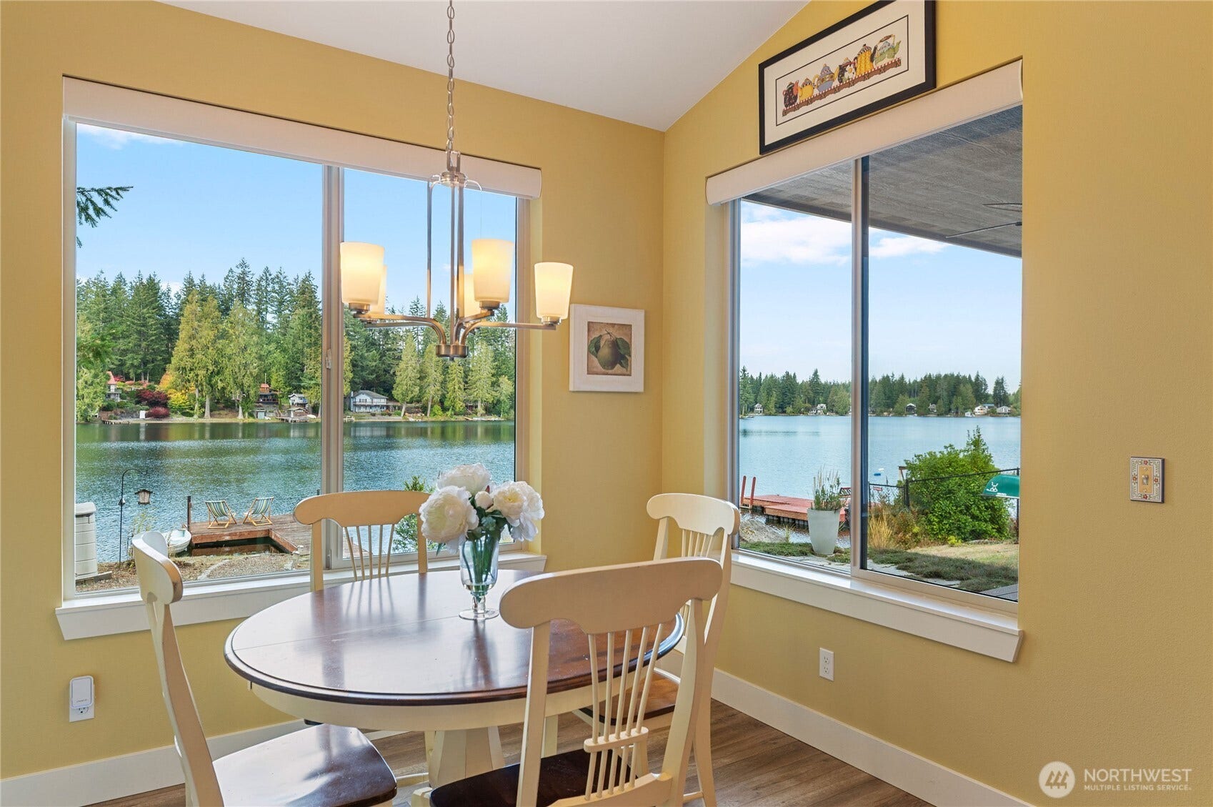 The dining nook takes full advantage of the lake views.