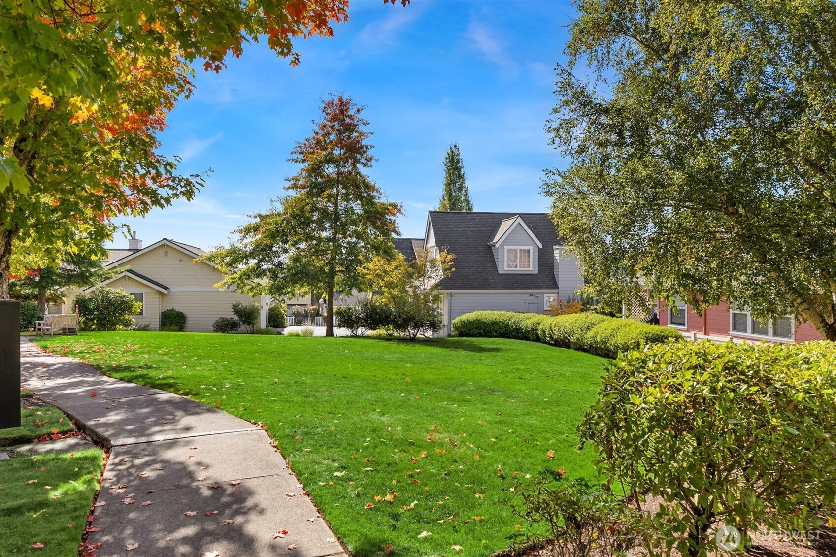 19800 Jensen Way NE, Poulsbo, WA 98370 The community shares expansive green lawns, mature trees, and a gently curving sidewalk to bring a park-like feel to the surrounding neighborhood.