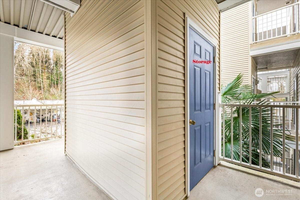 17426 Bothell Way NE, #A302, Bothell, WA 98011 This blue door you see here is extra storage, right across the entrance for unit 302A.