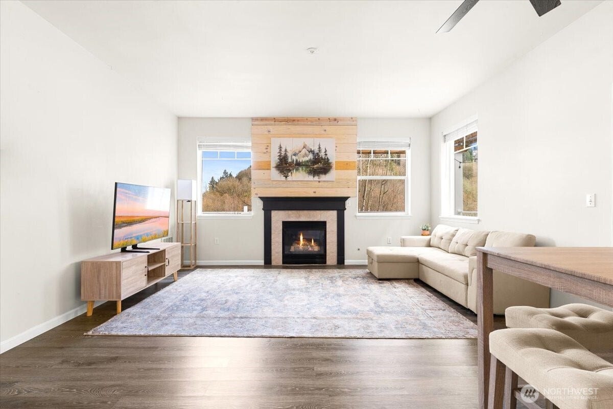 17426 Bothell Way NE, #A302, Bothell, WA 98011 Large living area with gas fireplace.