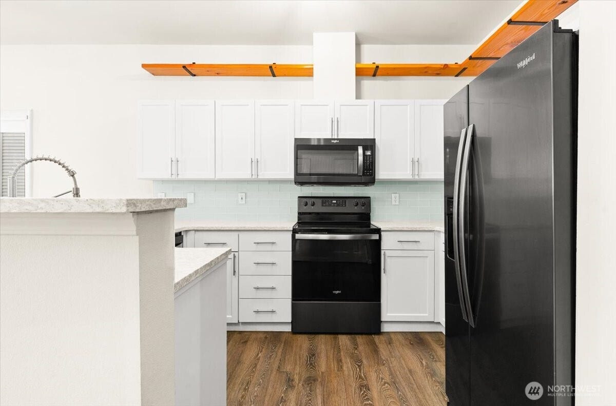 17426 Bothell Way NE, #A302, Bothell, WA 98011 Gorgeous Remolded Kitchen with new Cabinets, granite, and sink. All appliances are included.