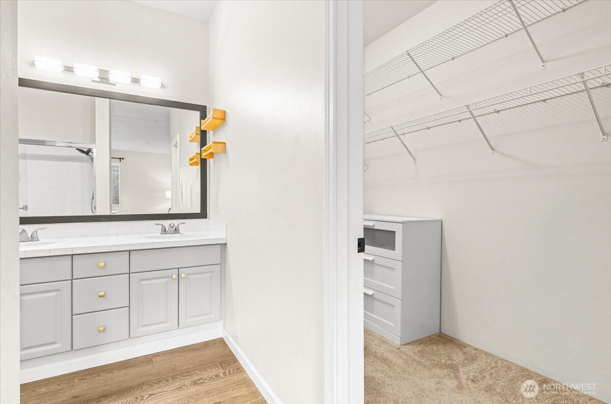 17426 Bothell Way NE, #A302, Bothell, WA 98011 Walik-In Closet and entrance into primary bedroom