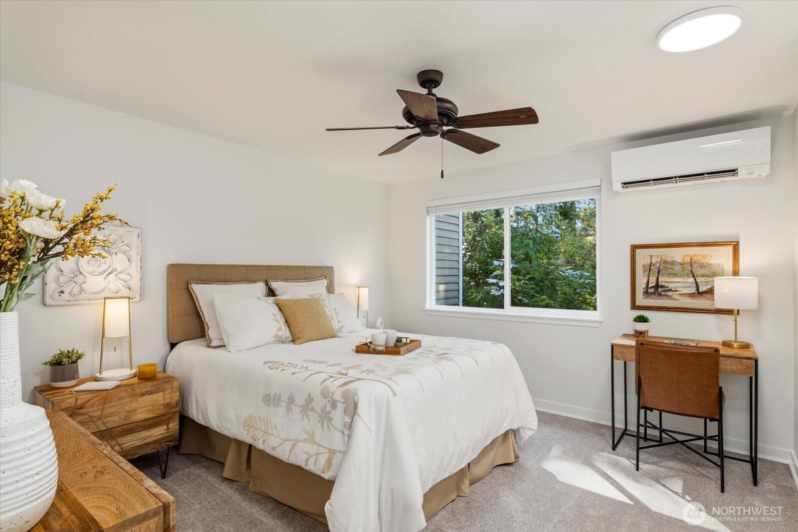 11411 102nd Court NE, Kirkland, WA 98033 Peaceful greenbelt views create a relaxing primary retreat and a mini split for comfortable living.