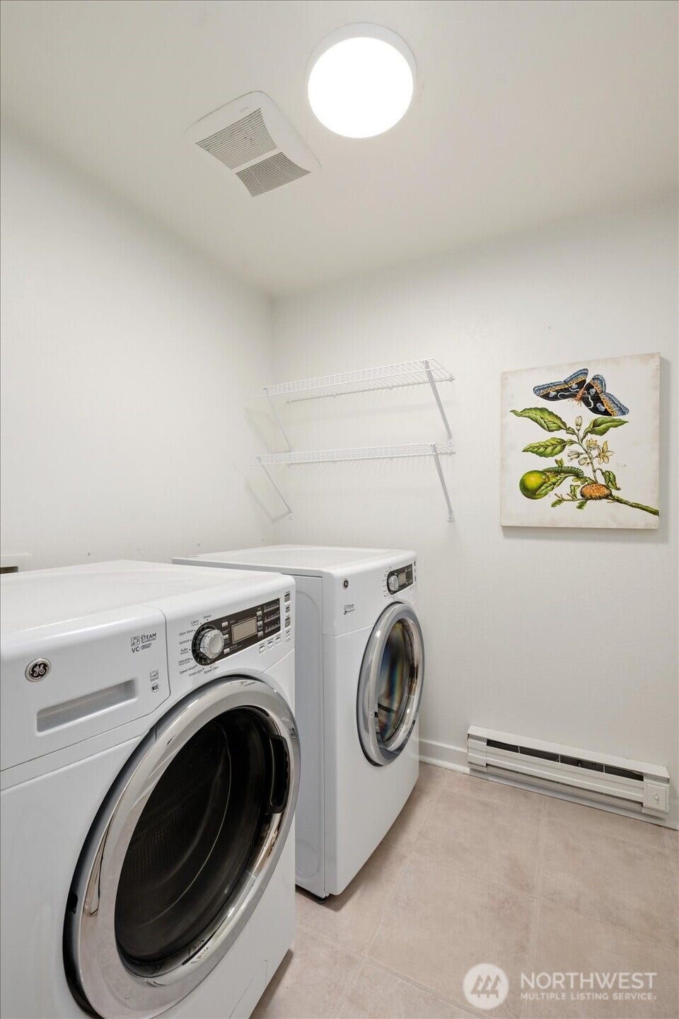 11411 102nd Court NE, Kirkland, WA 98033 Dedicated laundry room keeps everyday routines organized.