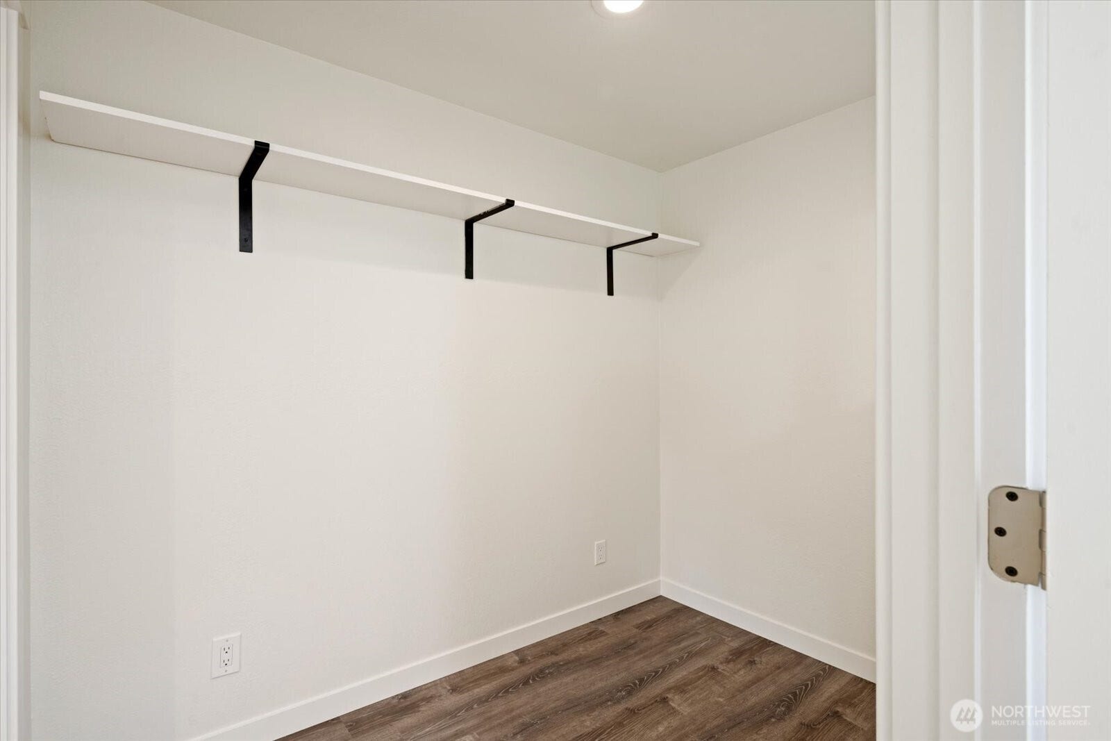 11411 102nd Court NE, Kirkland, WA 98033 Built-in shelving and generous square footage offer flexible storage or workspace/office potential.