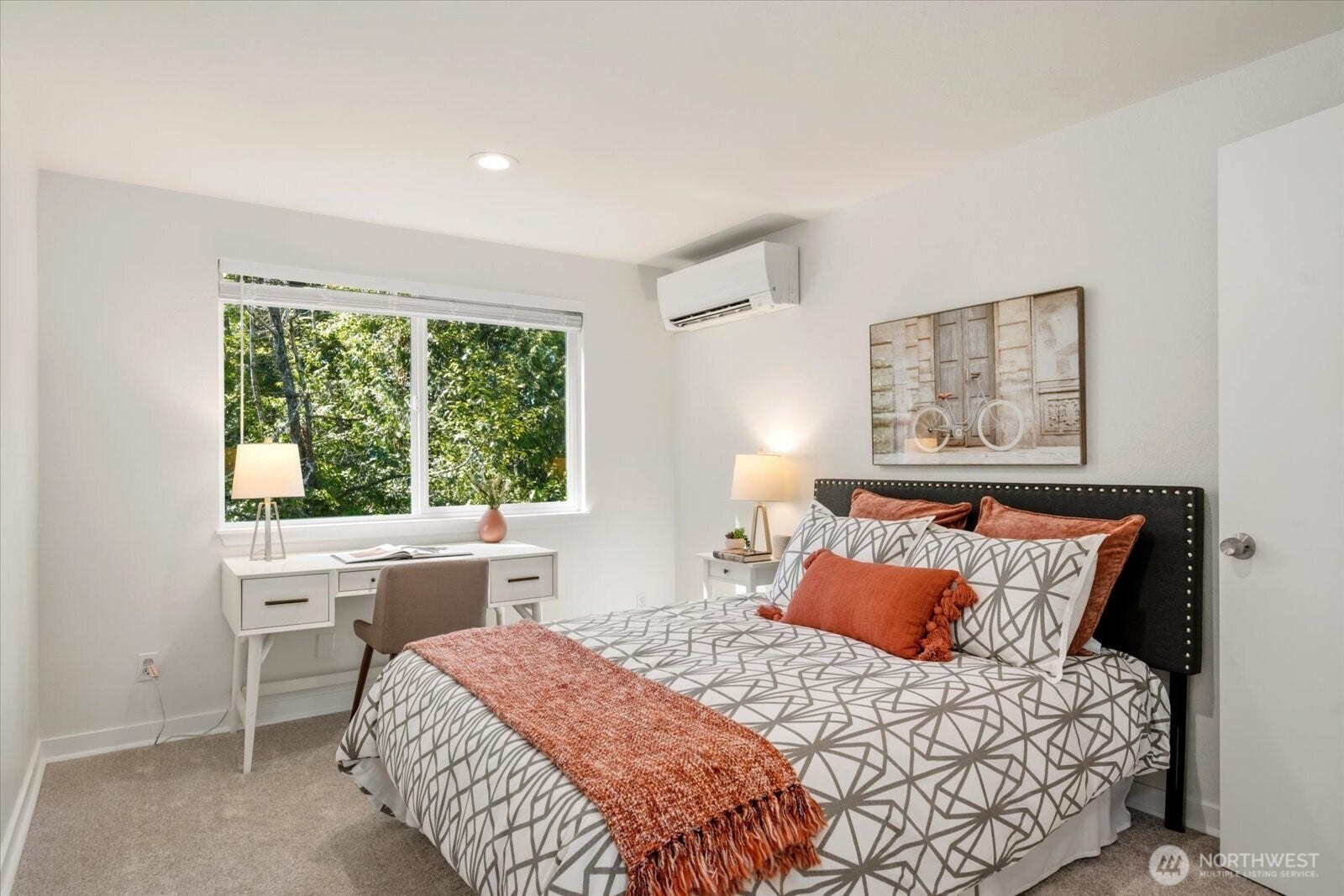 11411 102nd Court NE, Kirkland, WA 98033 The second bedroom offers peaceful views and a bright, versatile layout. Also appointed with a mini split!