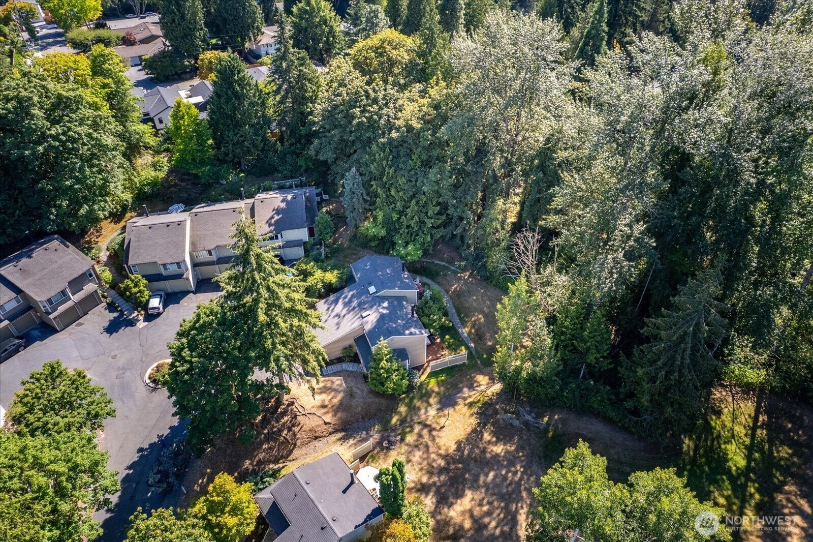 11411 102nd Court NE, Kirkland, WA 98033 HOA dues cover water, sewer, garbage, and common area maintenance for simplified, low-maintenance living.