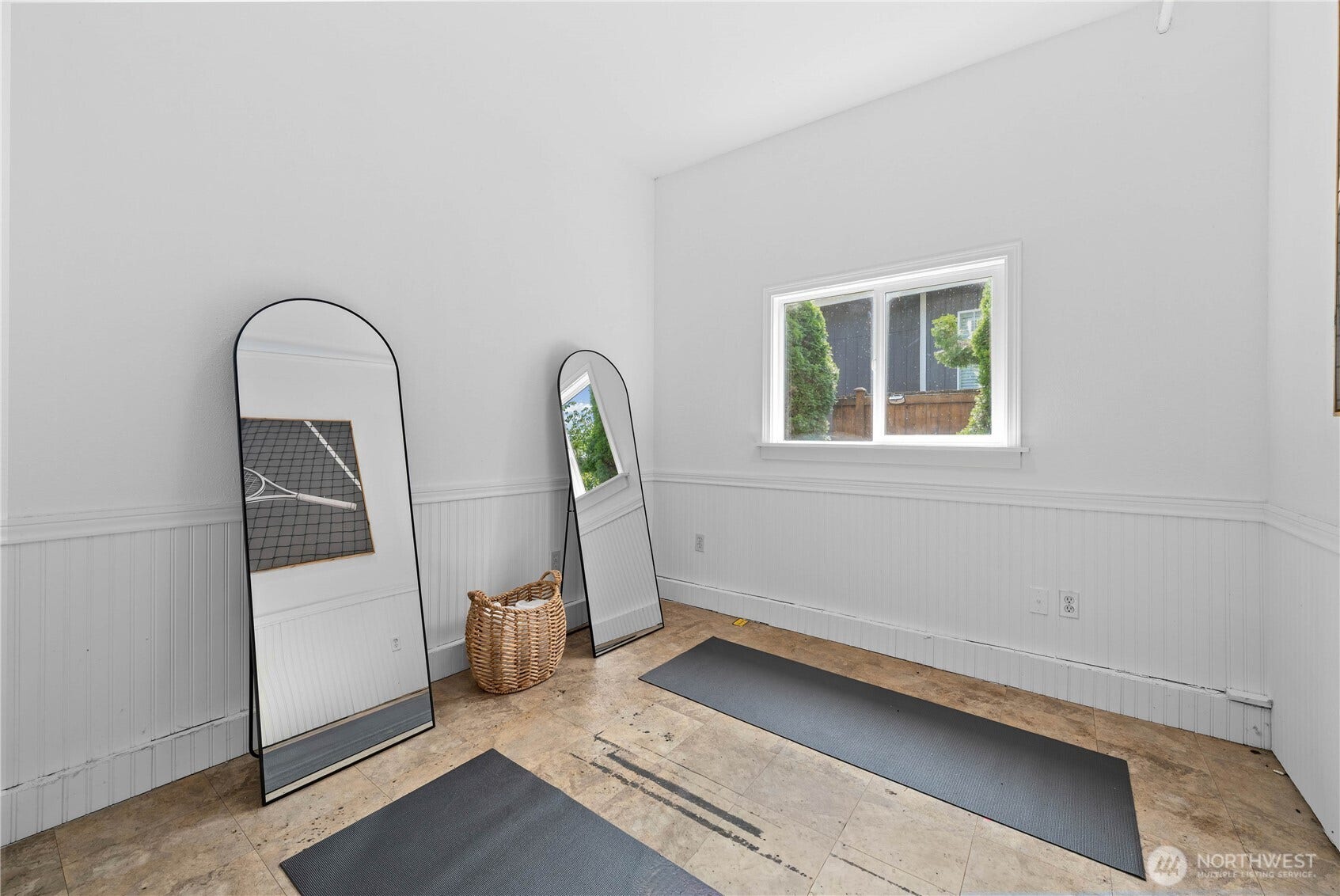 This versatile den/office space, at the back of the 3-car garage's third bay, offers endless possibilities. Imagine working from home, having a dedicated home gym, working on your hobbies or creative pursuits without having to keep it looking show ready! A window brings in natural light, creating a QUIET bonus space separate from the homes main living areas.