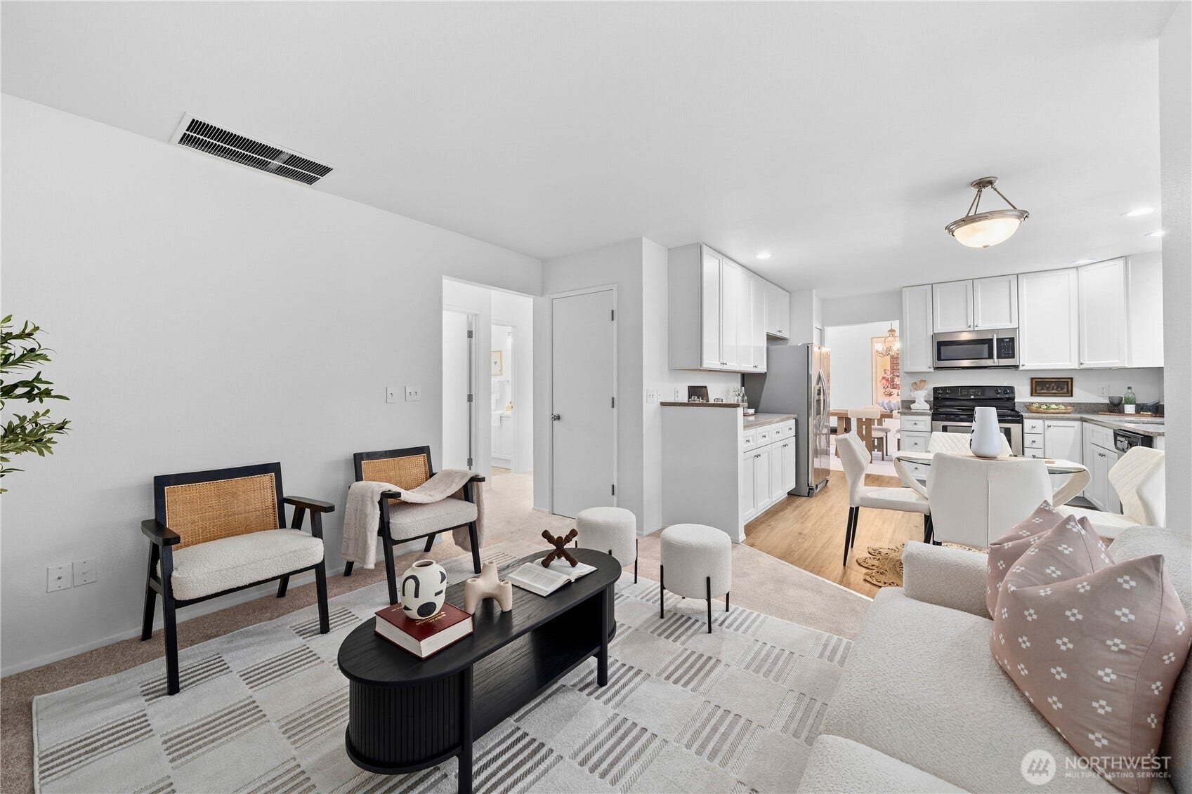 The family room flows easily into the kitchen, creating a connected layout ideal for everyday living and entertaining. Generous living space provide a versatile backdrop ready to make your own.