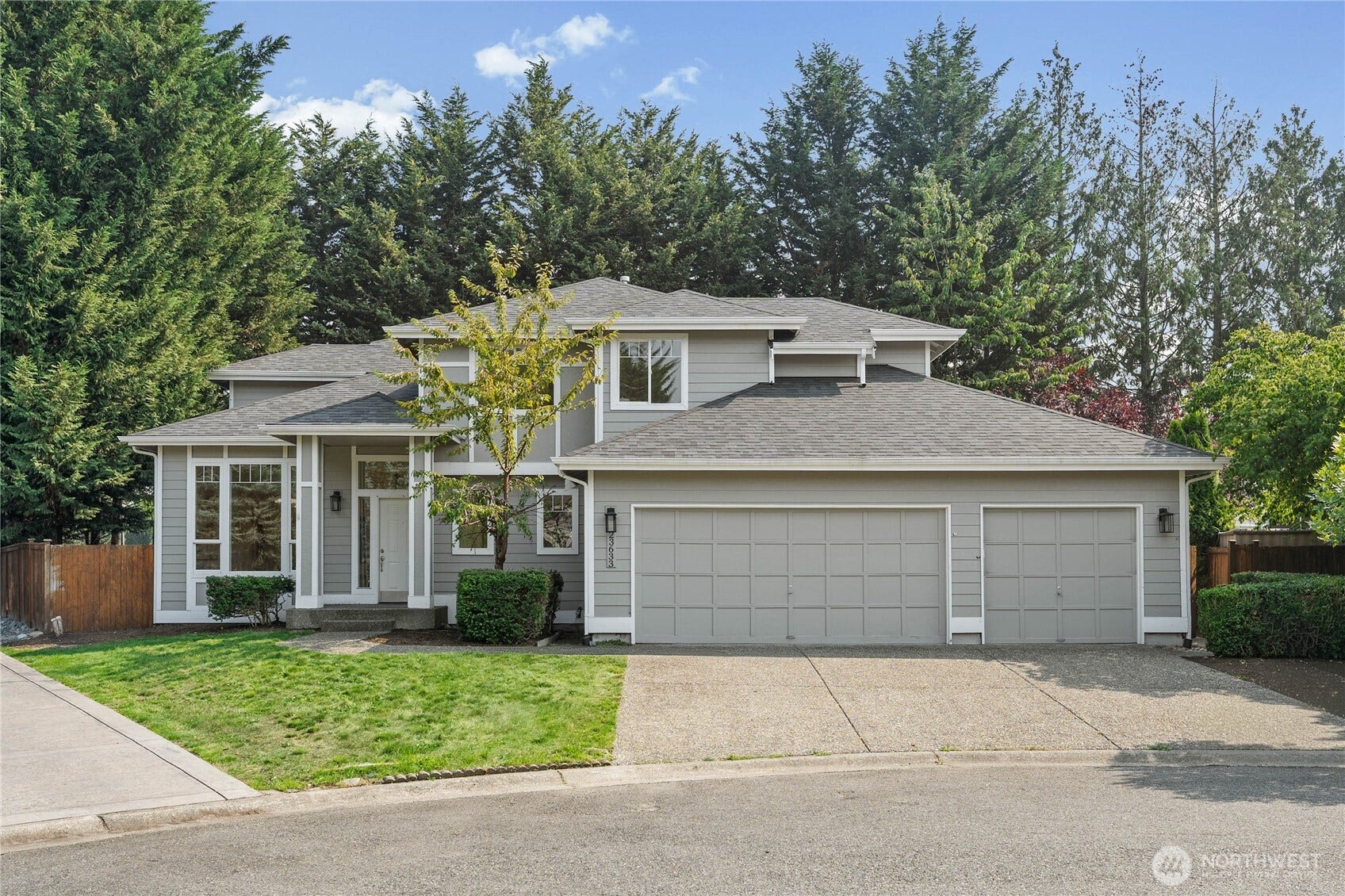 This home makes a statement before you walk in the door! Classic two-story, four-plus bedroom home in a cul-de-sac ~ prime location that will broaden your horizion! Super close and level walking distance to  the Cedar to Green River Trail and Four  Corner's shopping and restaurant district!