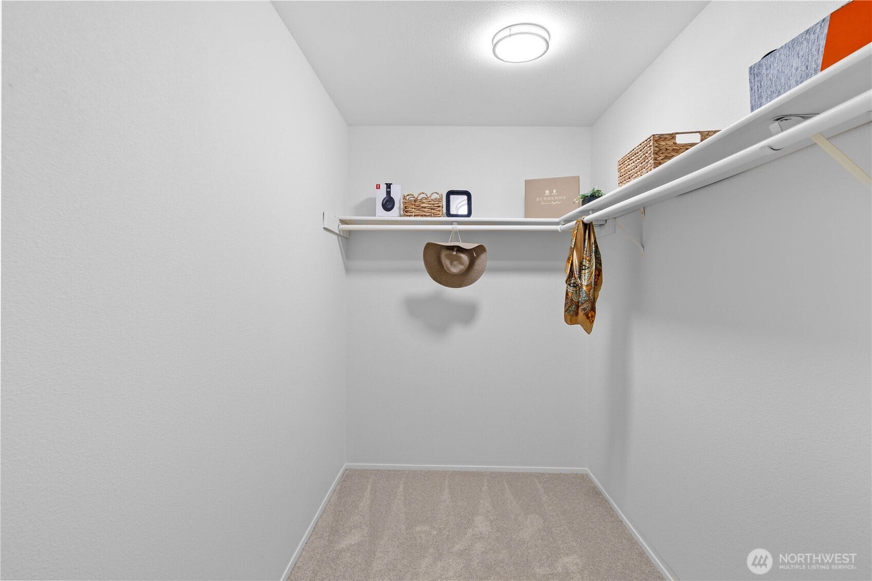The Primary Suites generous walk-in closet provides abundant space for clothing, shoes, and seasonal essentials. Wraparound shelving and hanging space make it easy to keep everything organized and within reach.