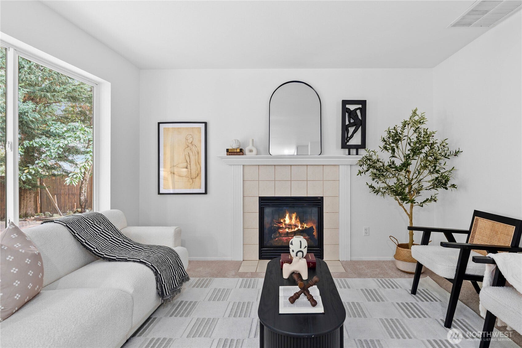 Generous proportions provide plenty of room for multiple seating arrangements, making this family room ideal for conversation, movie nights, any gathering. Fresh paint in neutral finishes and new carpet create a clean, move-in-ready space ready for your personal style.