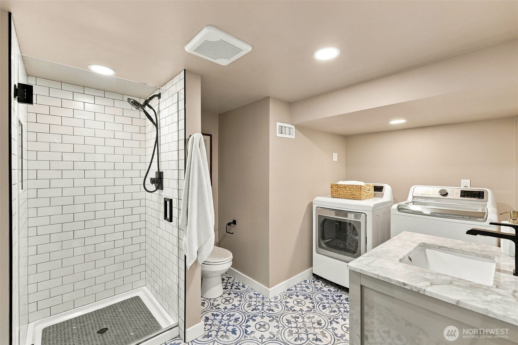 Third fully renovated bathroom and laundry.