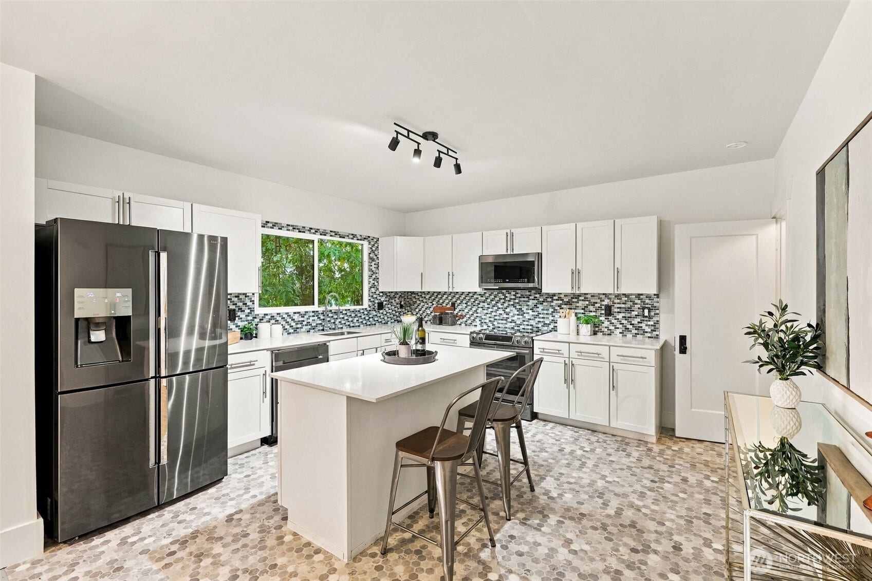 Spacious kitchen with eating space.