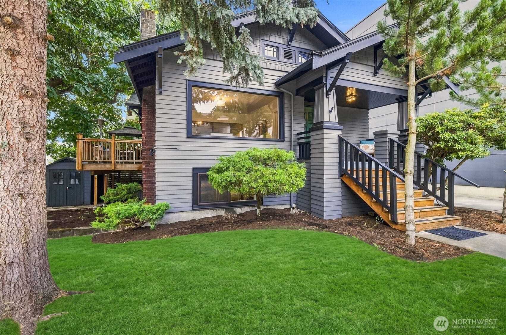 Beautifully renovated 5 bedroom, 3 bath craftsman home in Ballard with driveway parking for 2 vehicles.