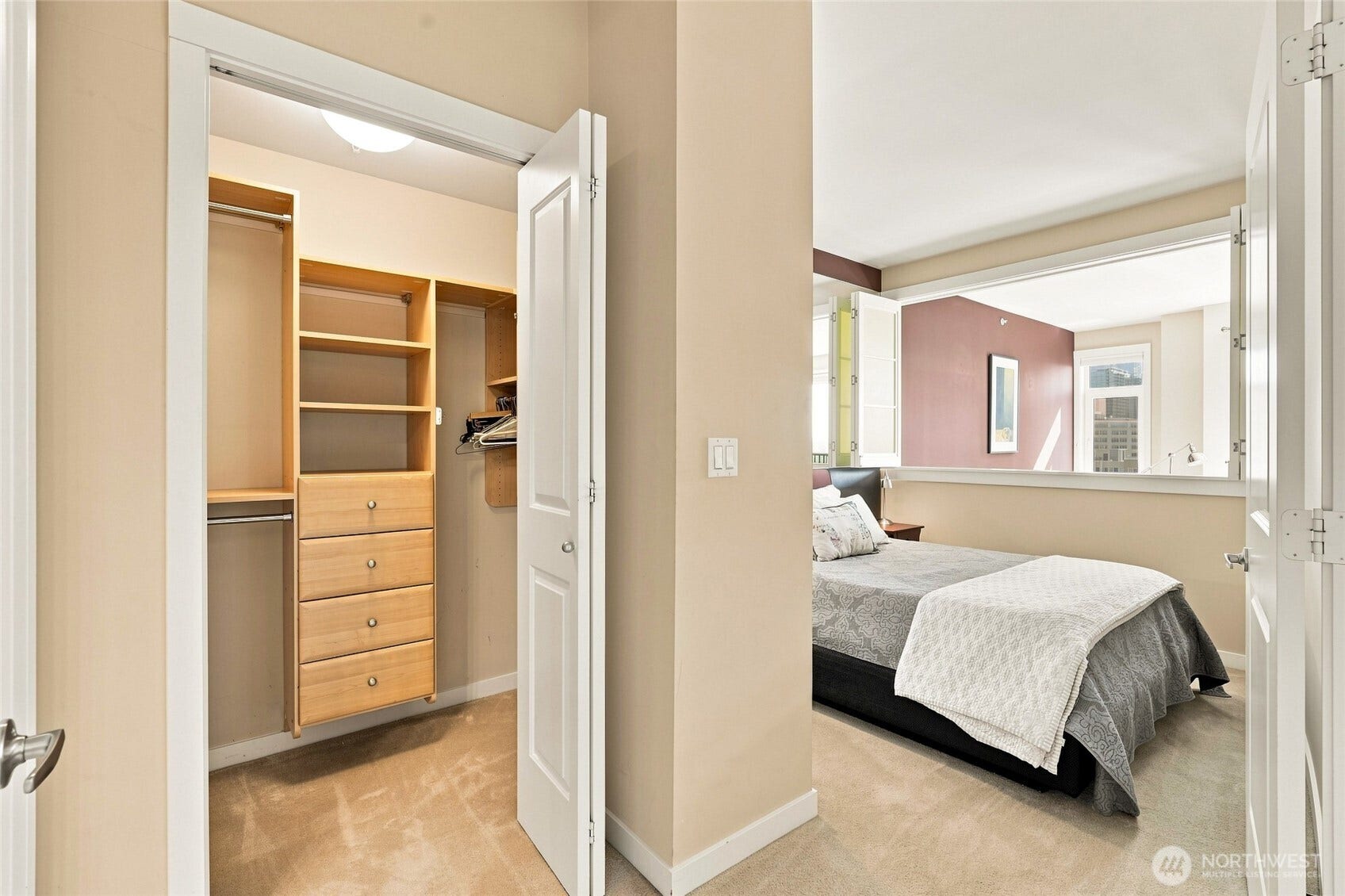 2607 Western Avenue, #1002, Seattle, WA 98121 Primary bedroom with walk-in closet and rice paper