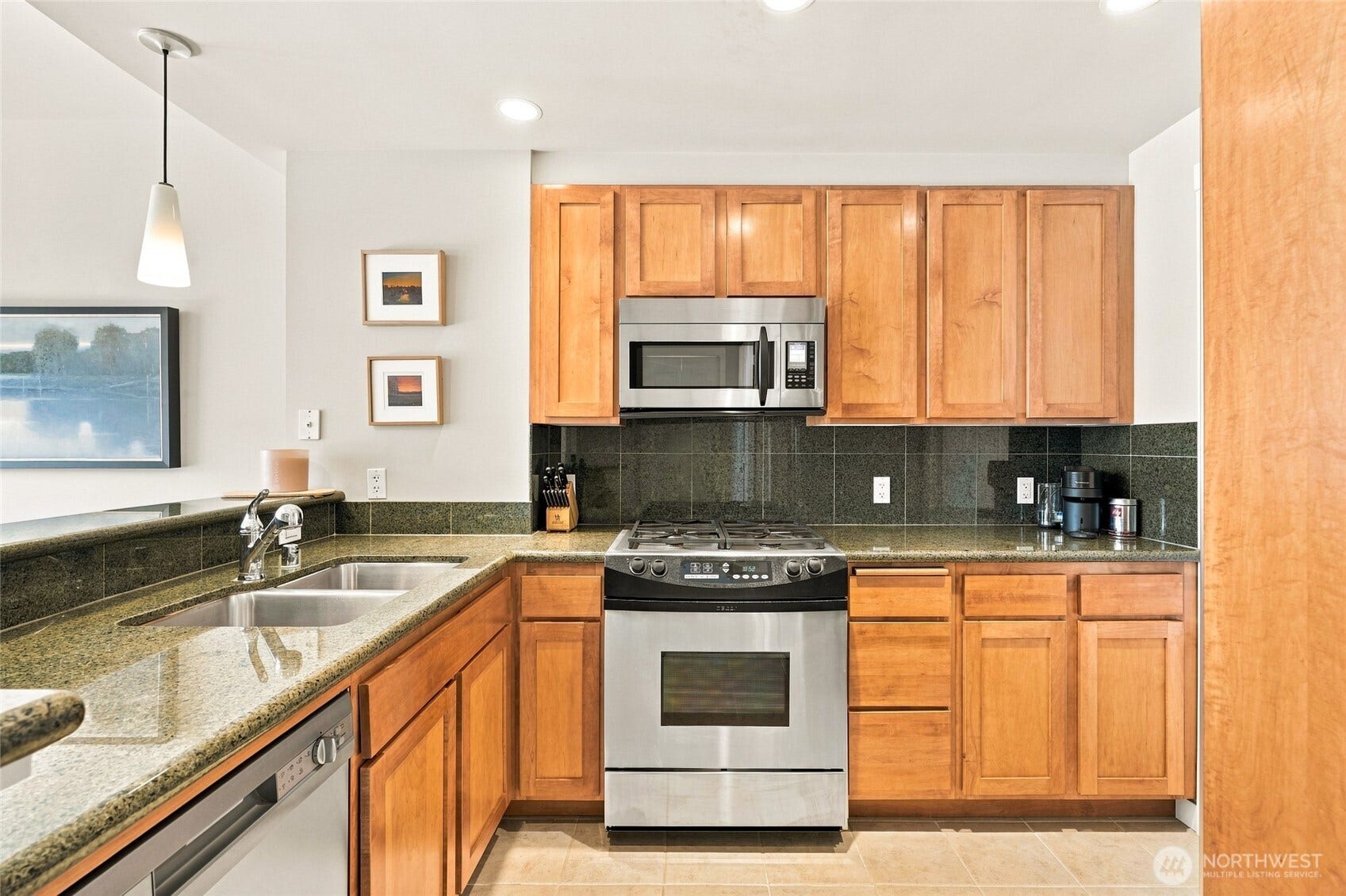 2607 Western Avenue, #1002, Seattle, WA 98121 Kitchen with stainless steel appliances.