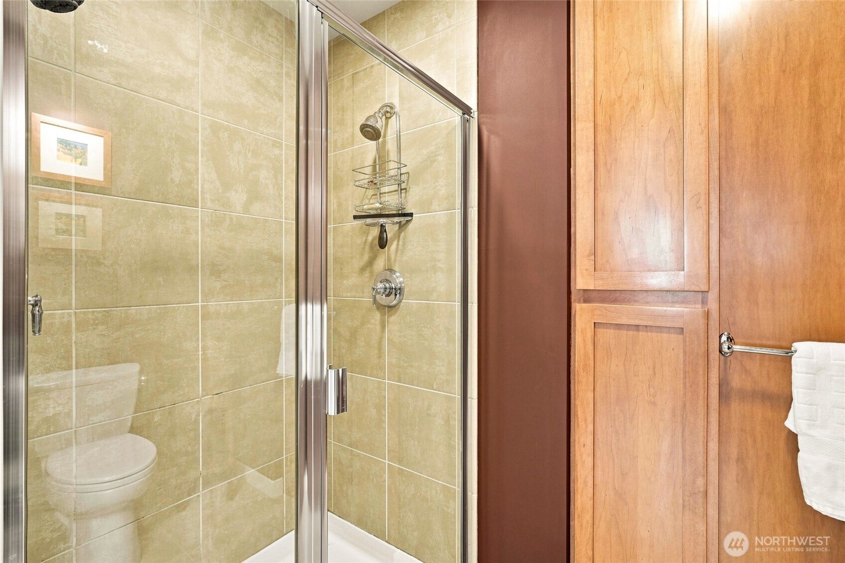 2607 Western Avenue, #1002, Seattle, WA 98121 Double-headed tile shower with pocket door for added privacy.