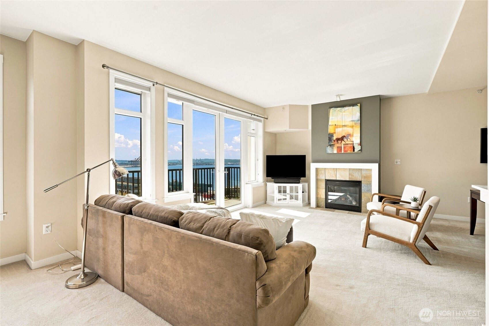 2607 Western Avenue, #1002, Seattle, WA 98121 Open living room with french doors to private balcony.