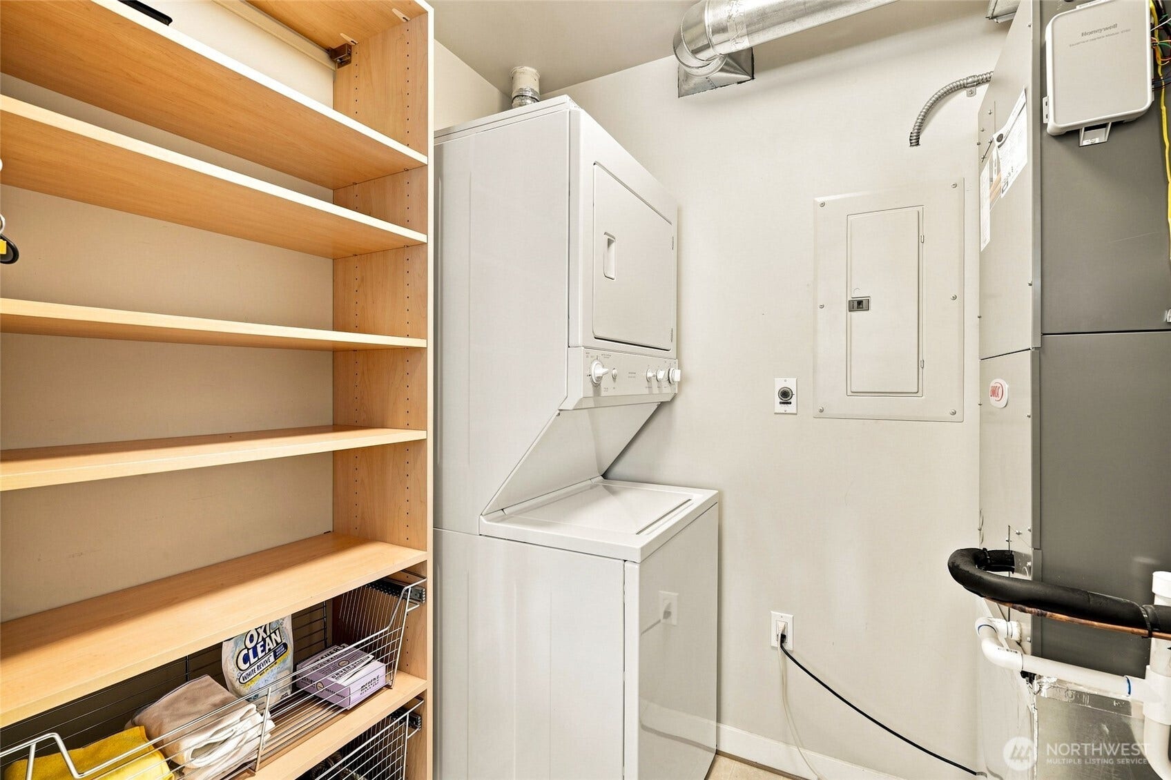 2607 Western Avenue, #1002, Seattle, WA 98121 Utility closet off kitchen. W/D, Hot water tank, Furnace and pantry space.
