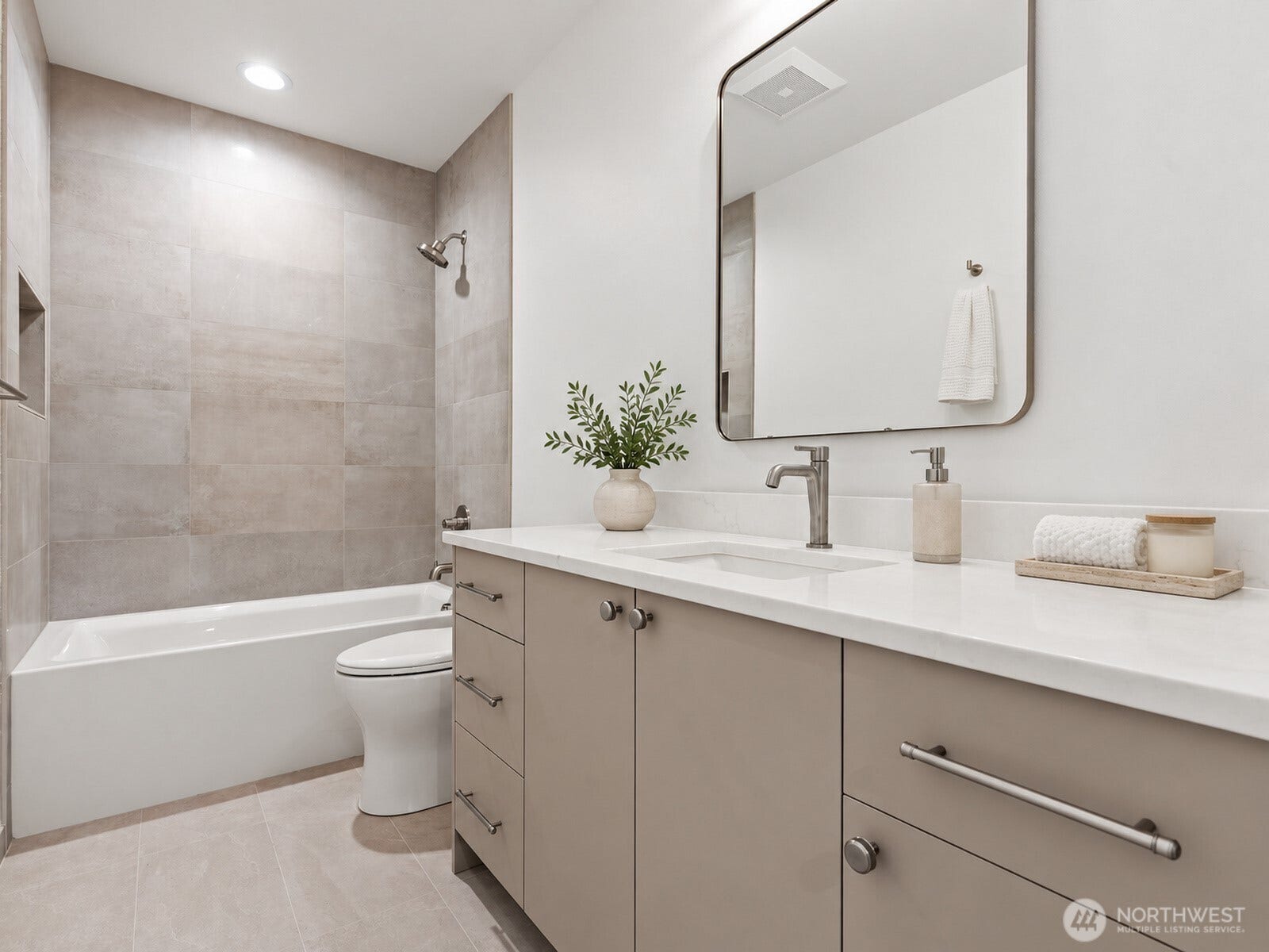 309 NW 52nd Street, Seattle, WA 98107 Convenient lower level full bath. virtual staged