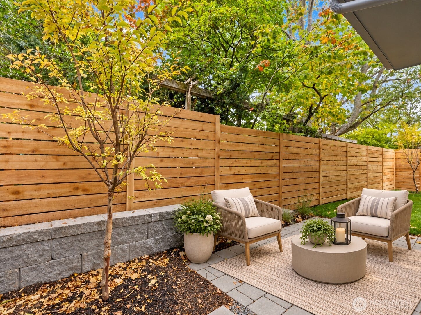309 NW 52nd Street, Seattle, WA 98107 Fully fenced back yard with patio. virtual staged