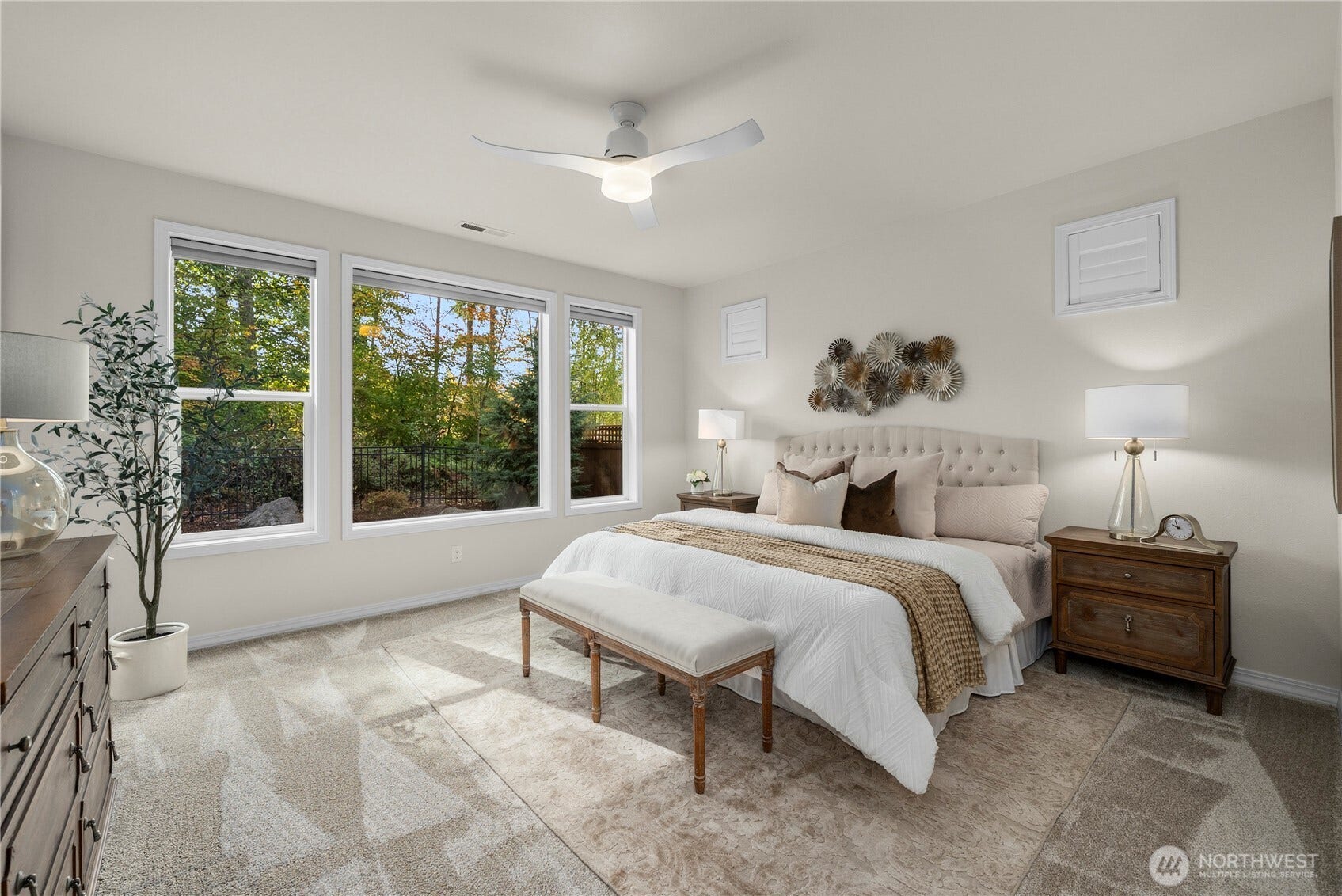 19014 146th Street E, Bonney Lake, WA 98391 Spacious primary bedroom with brand new carpet, plantation shutters and motorized window coverings.