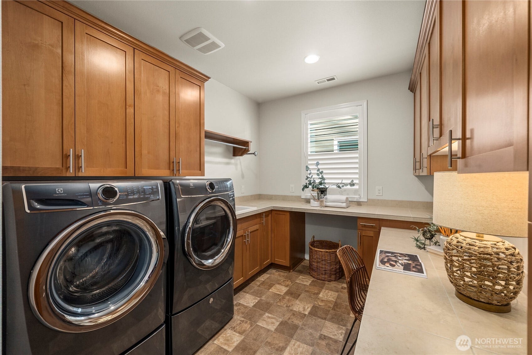 19014 146th Street E, Bonney Lake, WA 98391 The Smart space is a laundry/mud/craft/work space offering even more storage. Plus a walk-in pantry & plantation shutters.