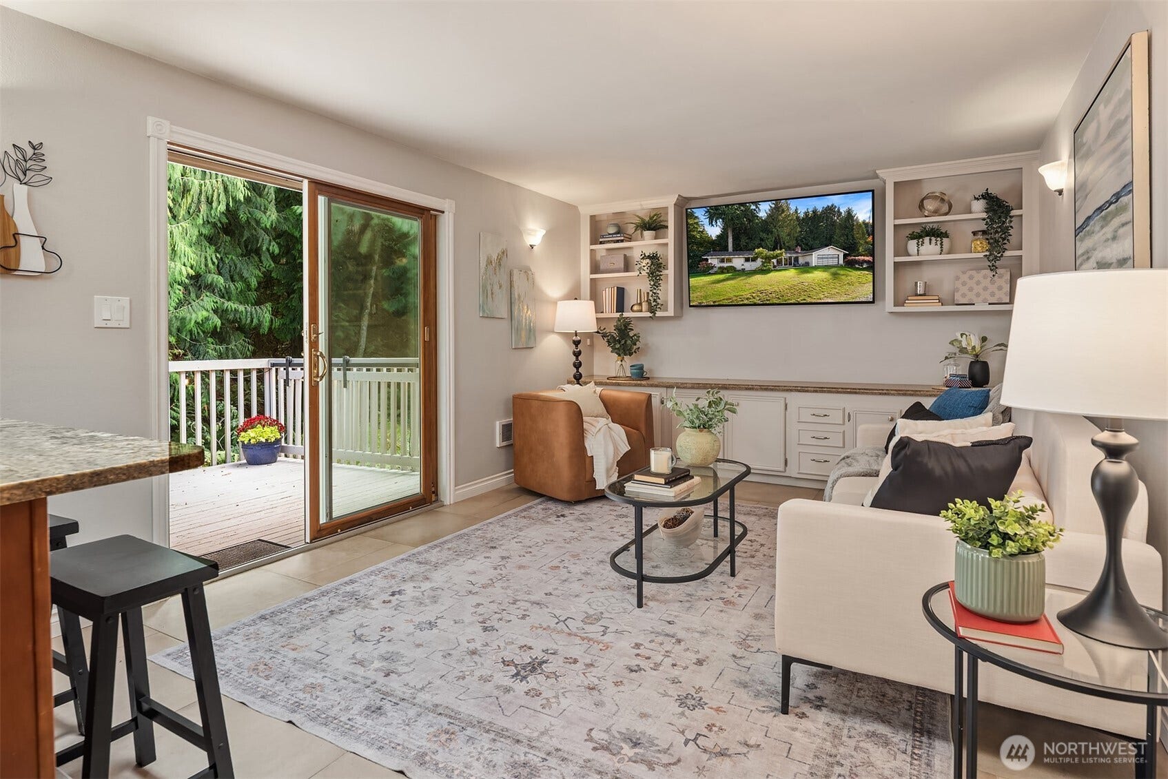 12824 141st Place SE, Snohomish, WA 98290 The family room with built in cabinets has access to the back deck as well.