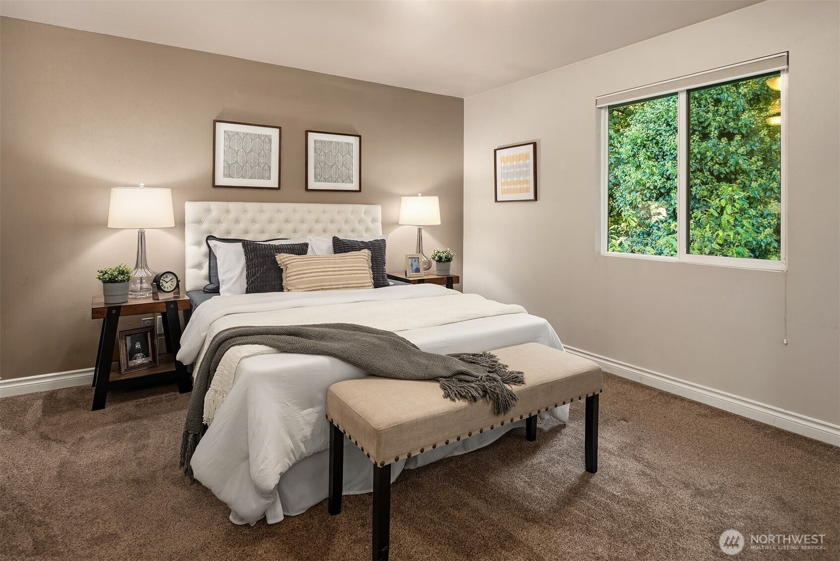 12824 141st Place SE, Snohomish, WA 98290 A warm and inviting primary bedroom.