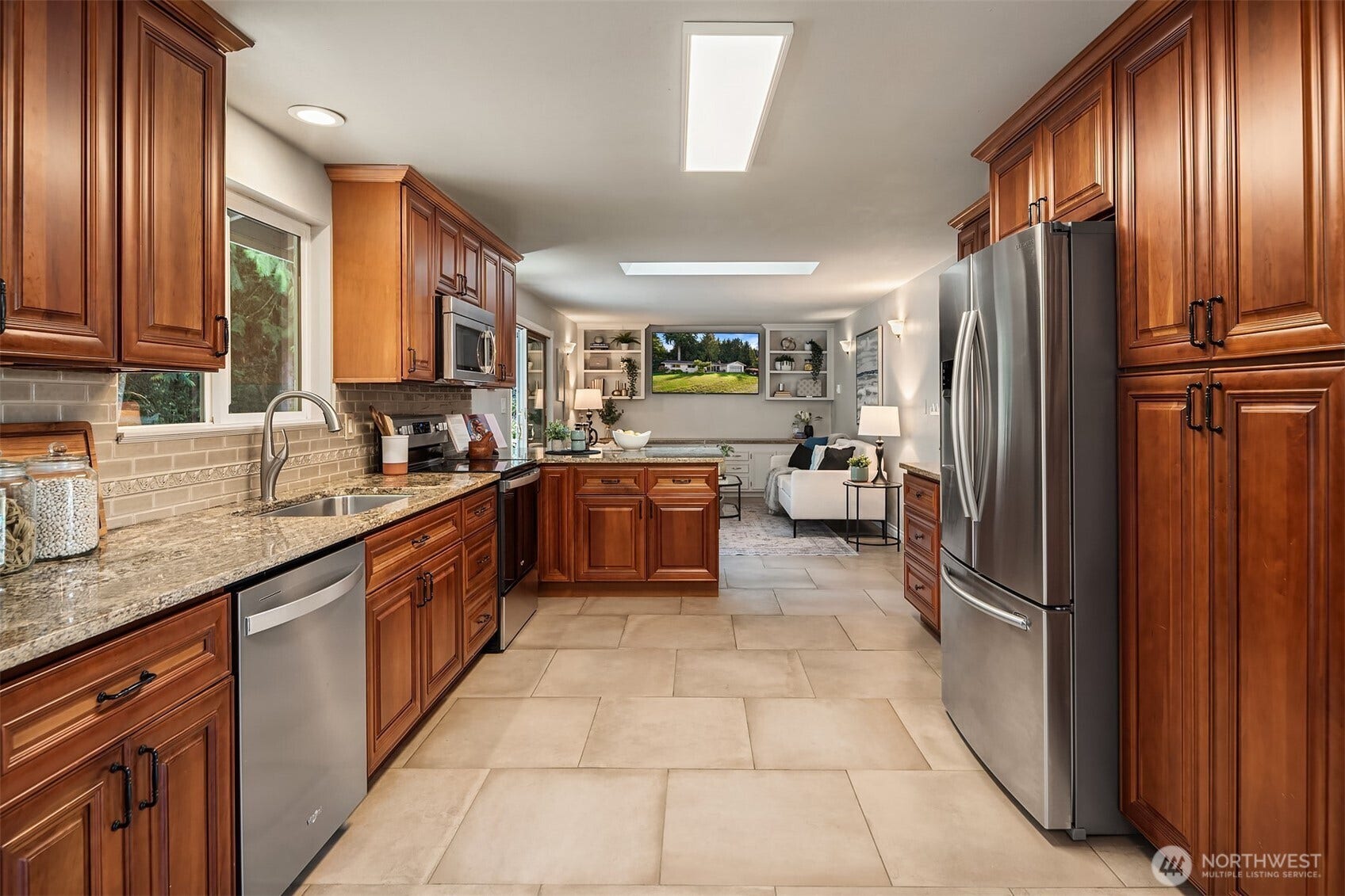 12824 141st Place SE, Snohomish, WA 98290 Gorgeous updates with full height cabinets, granite countertops and tile floors are as timeless as they are beautiful.
